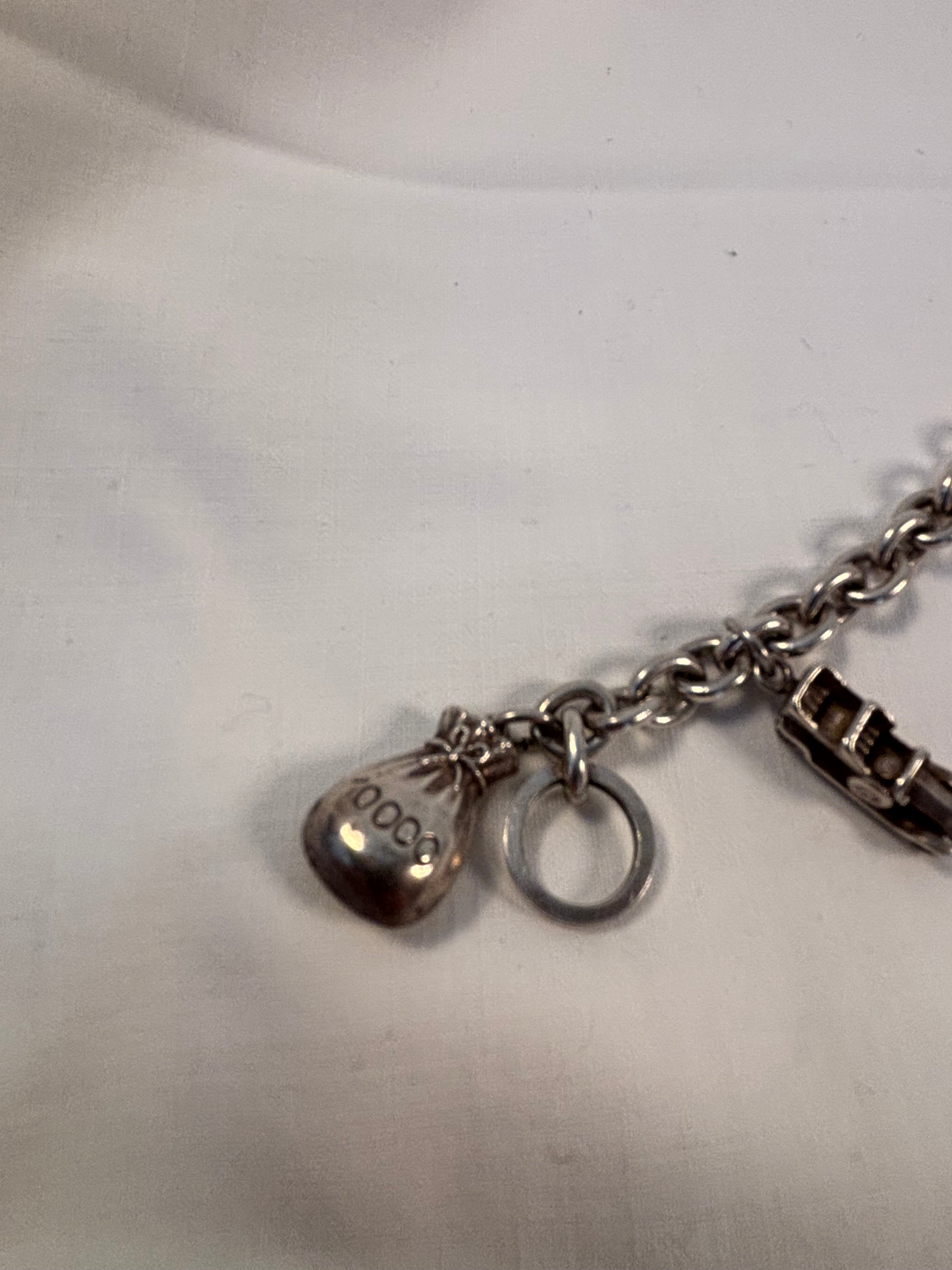 Charm armbånd i sølv