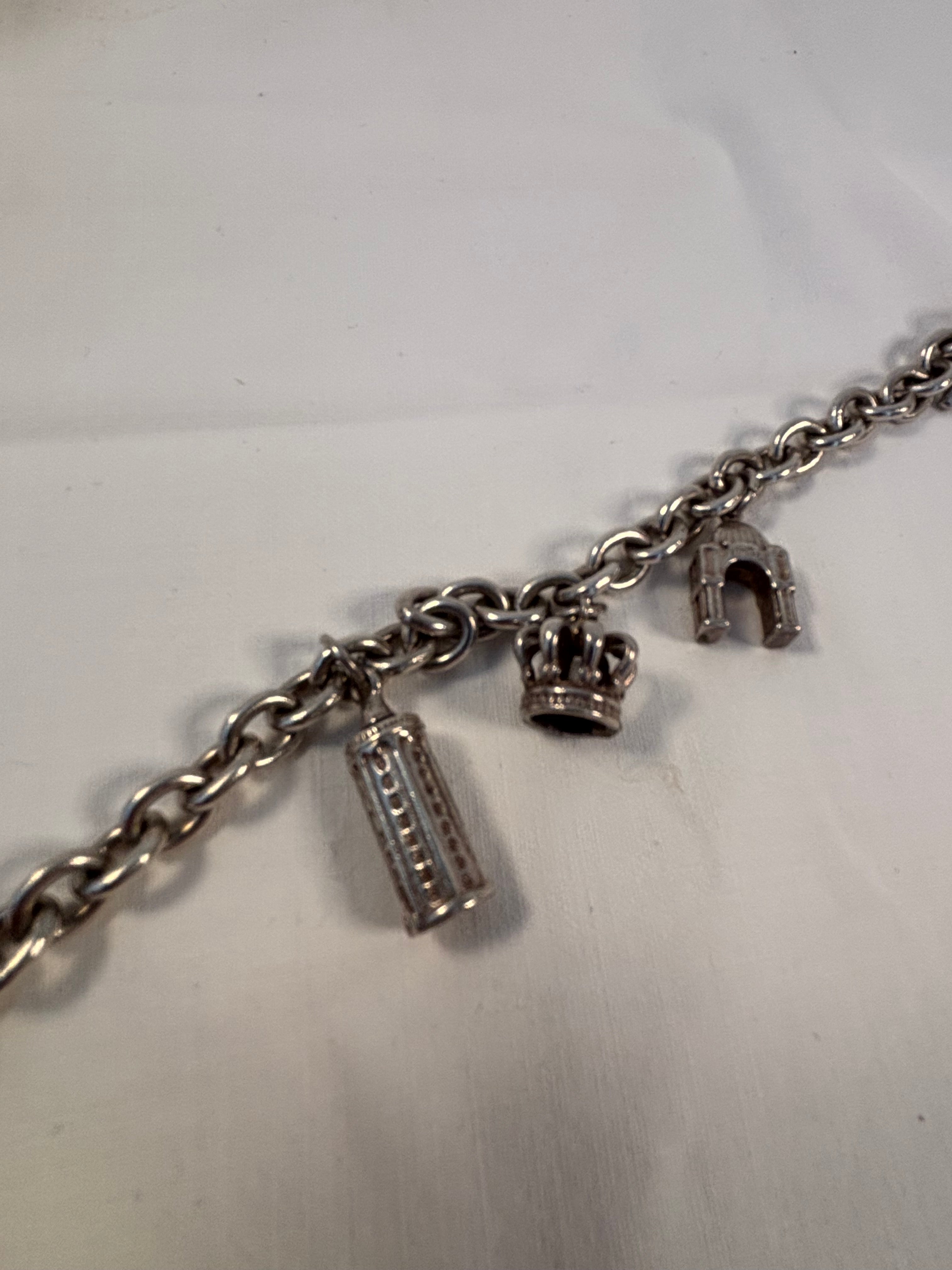 Charm armbånd i sølv