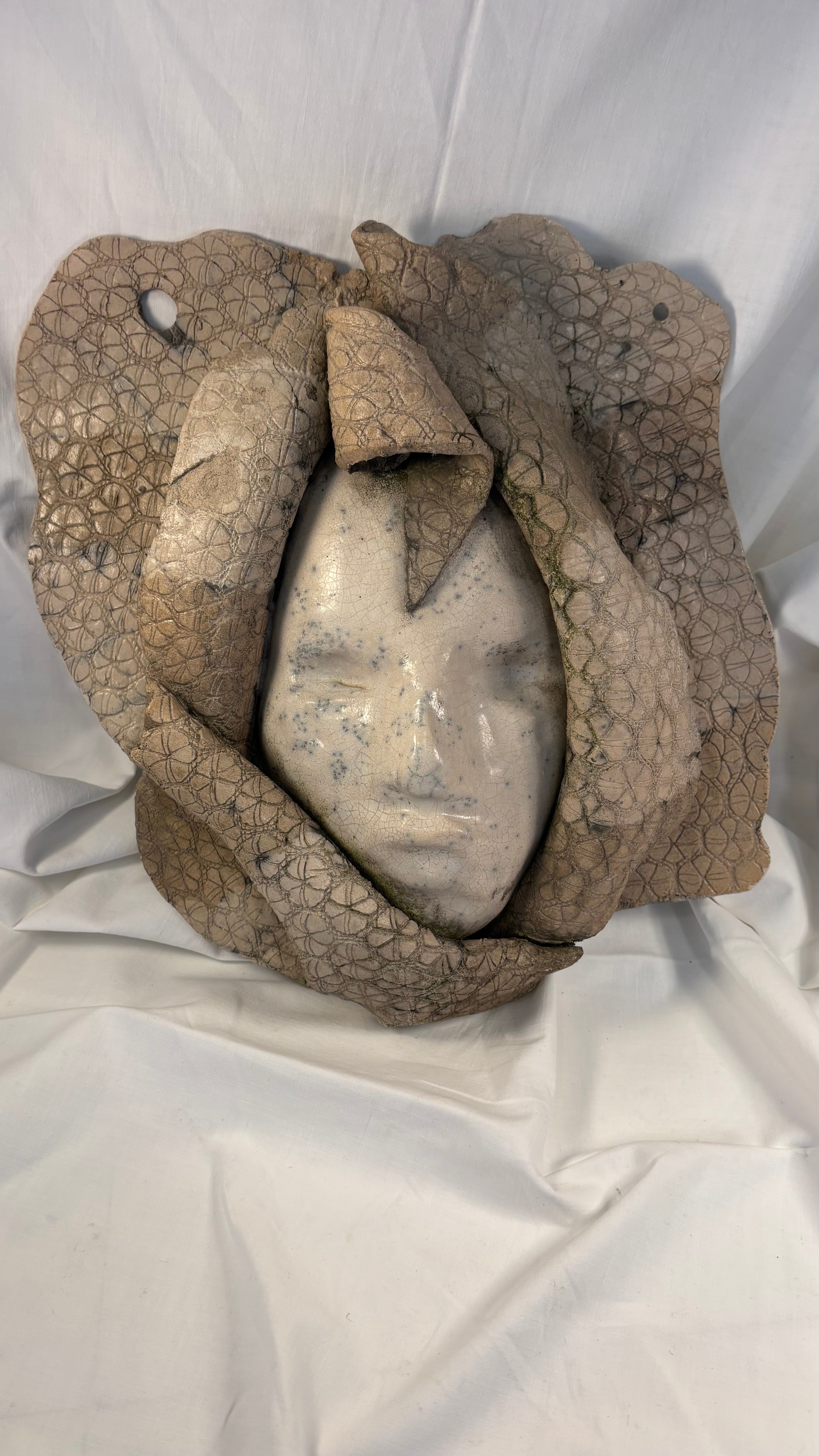 Keramisk relief maske