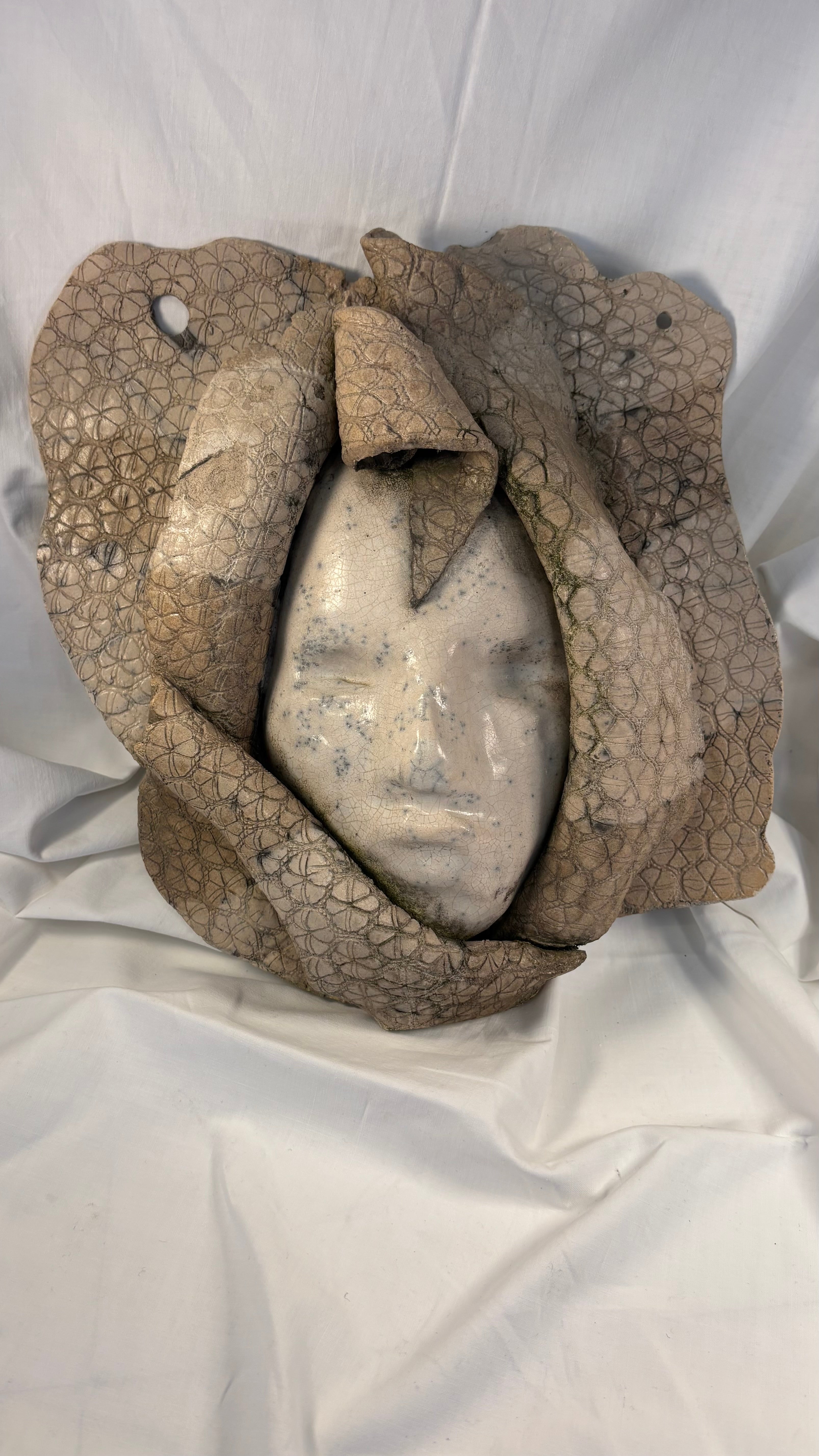 Keramisk relief maske