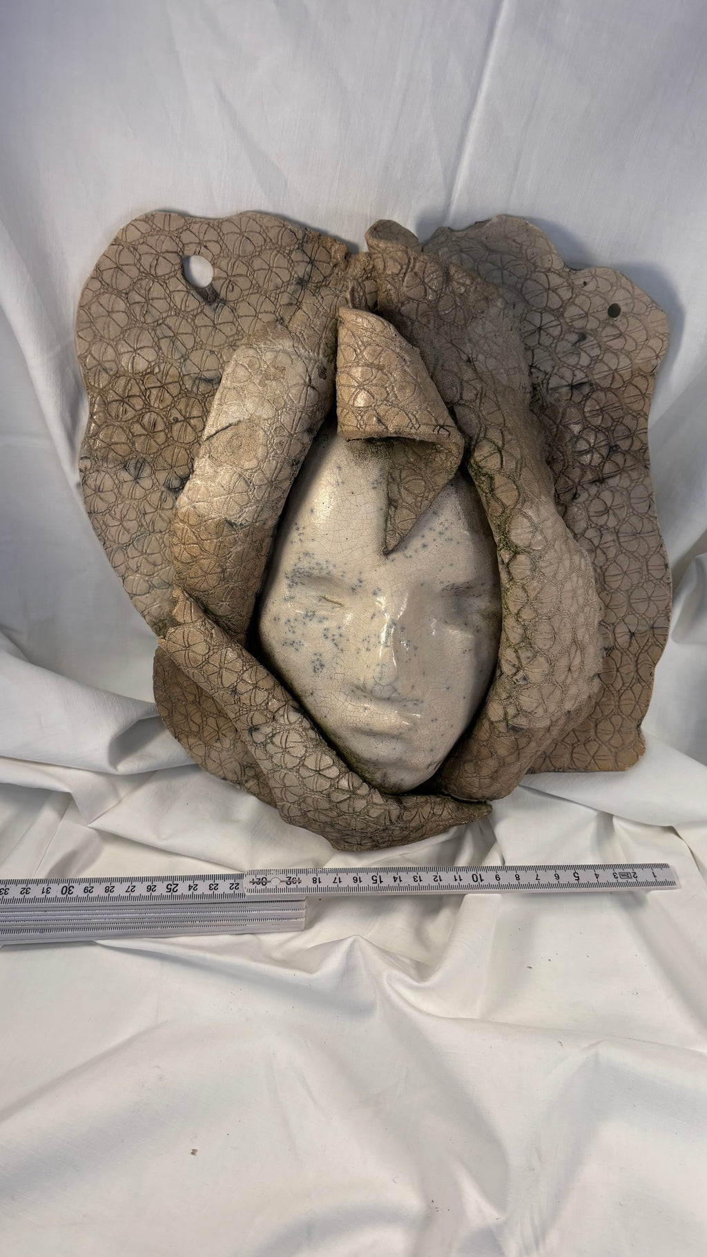 Keramisk relief maske