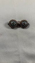 En blomsterbroche i edwardiansk stil