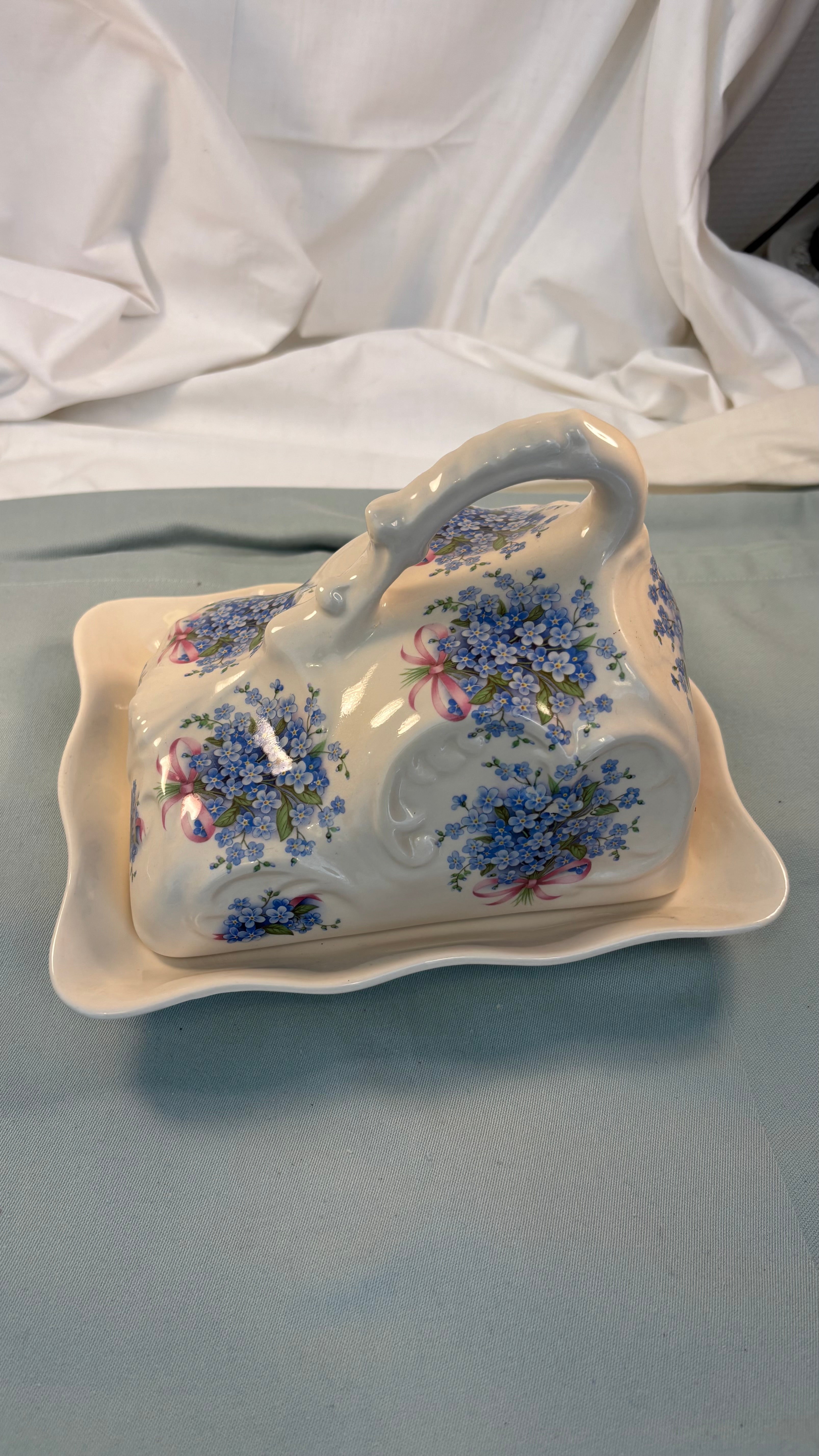 Vintage osteklokke i porcelæn
