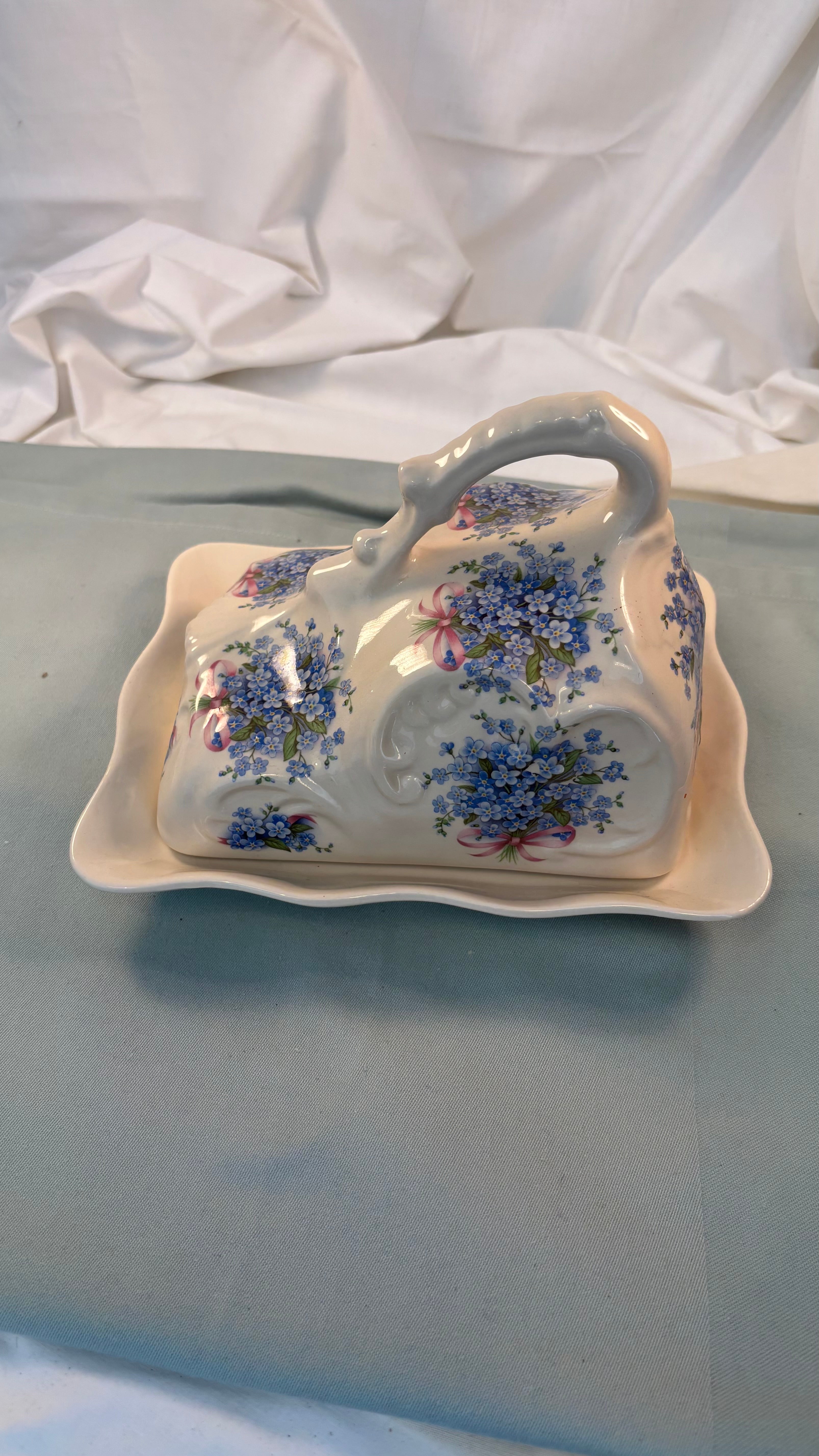 Vintage osteklokke i porcelæn