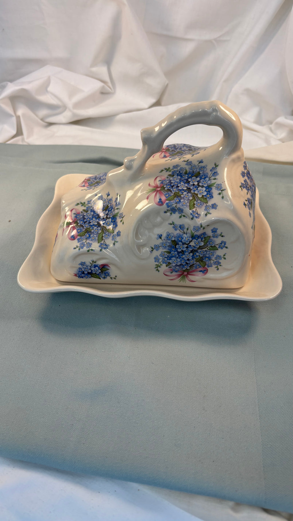Vintage osteklokke i porcelæn