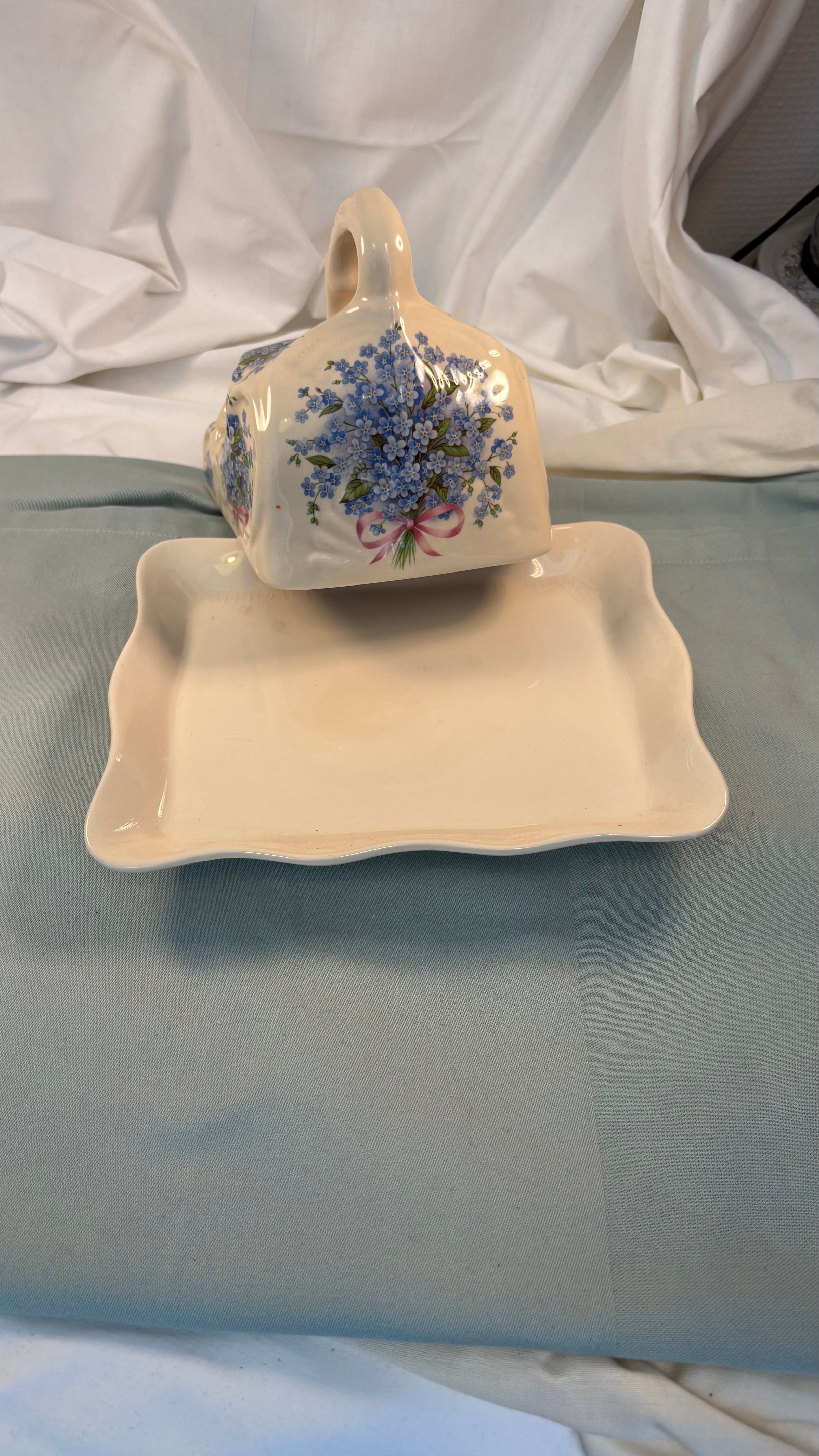 Vintage osteklokke i porcelæn